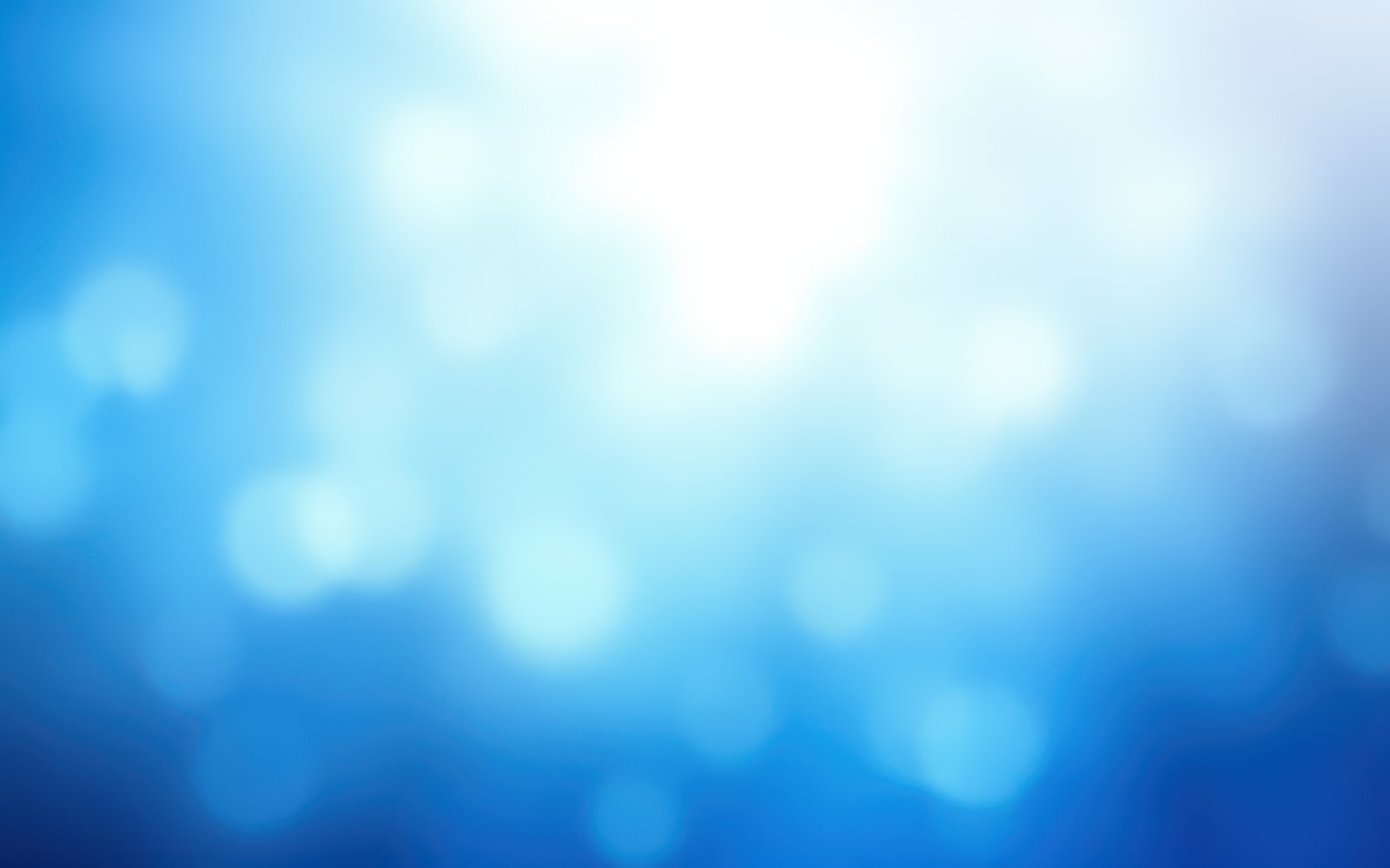 Vibrant blue and white light patterns create a serene and calming atmosphere in a soft focus background
